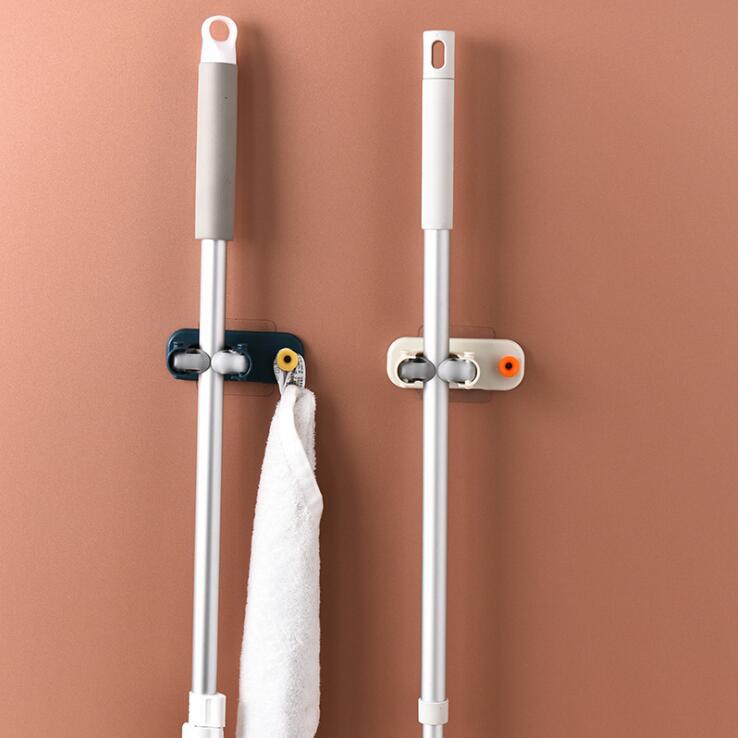 🔥 Last Day 49% OFF🔥2pcs wall-mounted non-punching automatic grip mop holder